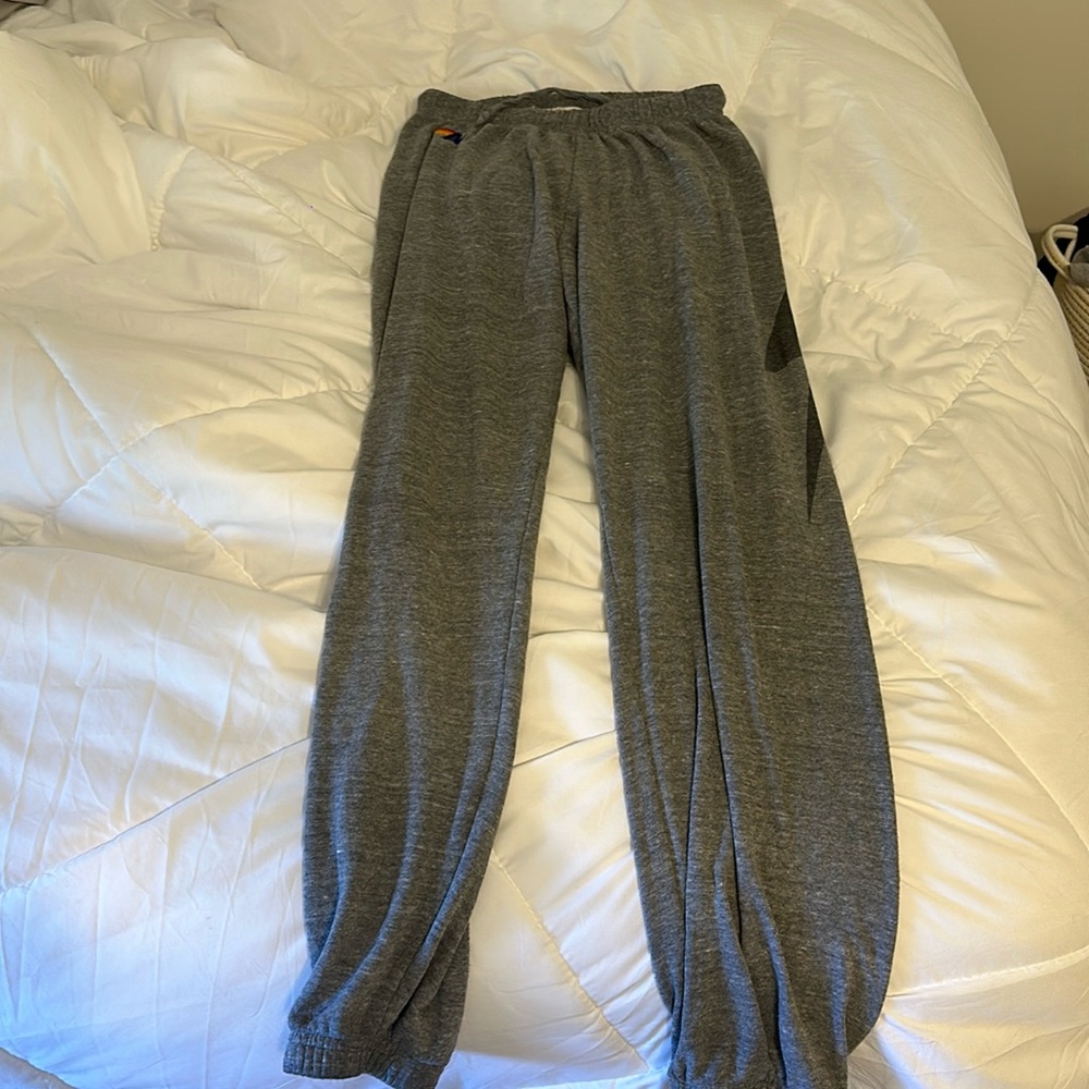 Grey aviator nation sweatpants with the lighting bolt on the side